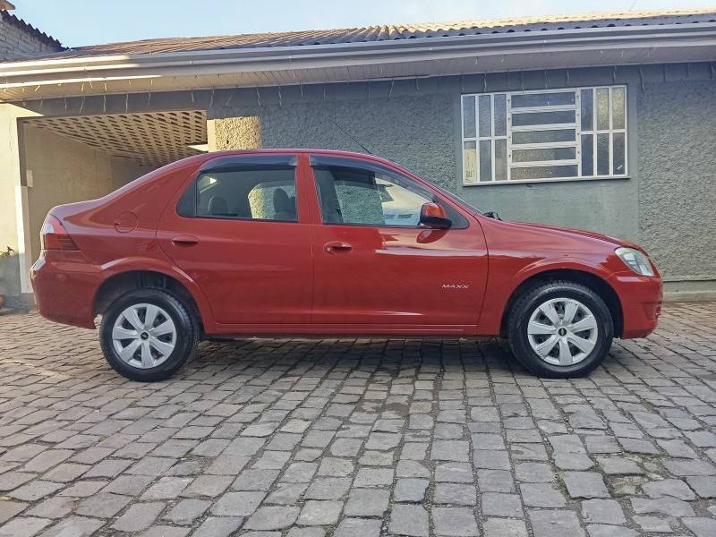 CHEVROLET - PRISMA - 2010/2010 - Vermelha - R$ 29.900,00