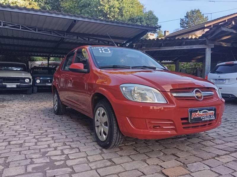 CHEVROLET - PRISMA - 2010/2010 - Vermelha - R$ 29.900,00