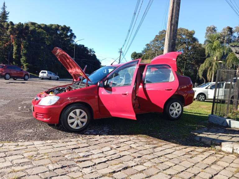 CHEVROLET - PRISMA - 2010/2010 - Vermelha - R$ 29.900,00