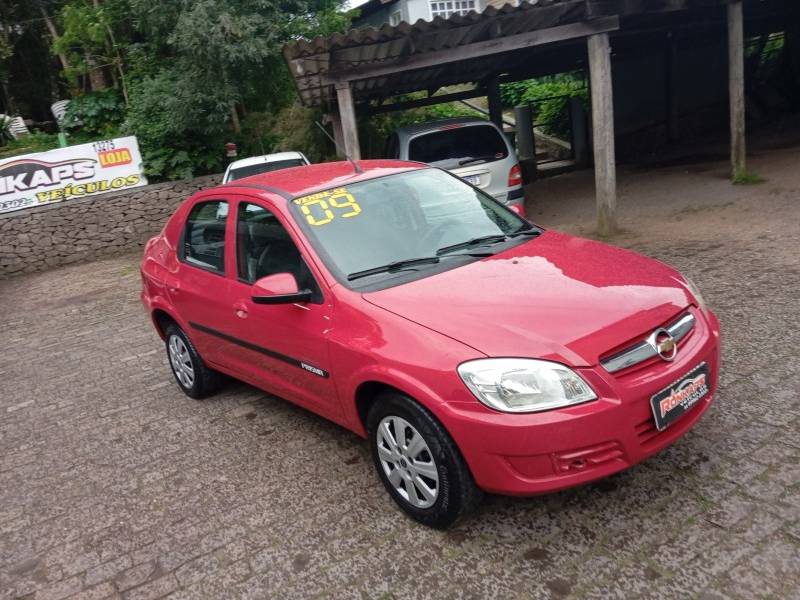 CHEVROLET - PRISMA - 2009/2009 - Vermelha - R$ 25.900,00